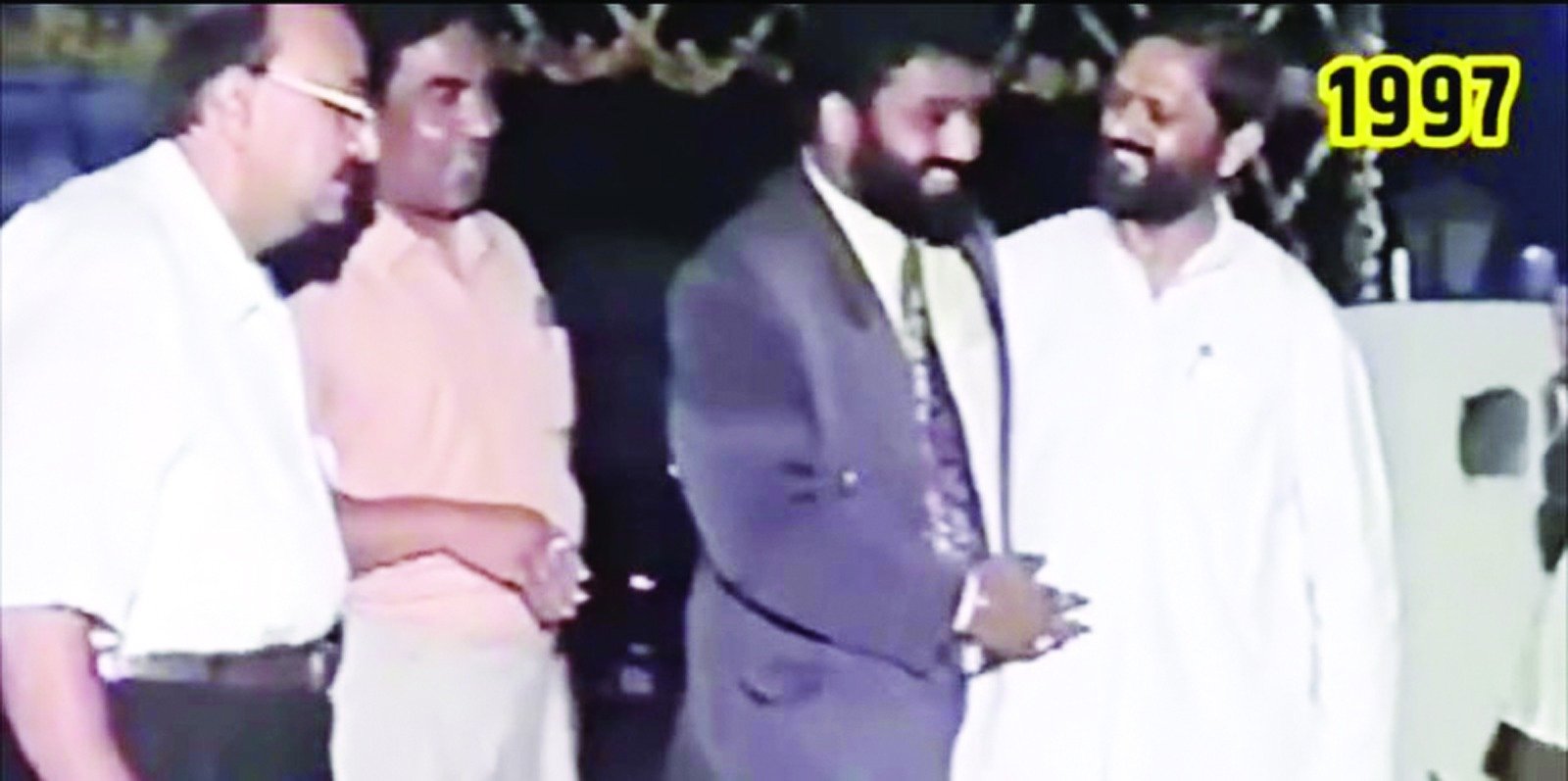 What does Ashish Tayal react to the photo of CM and Nirmal Singh?